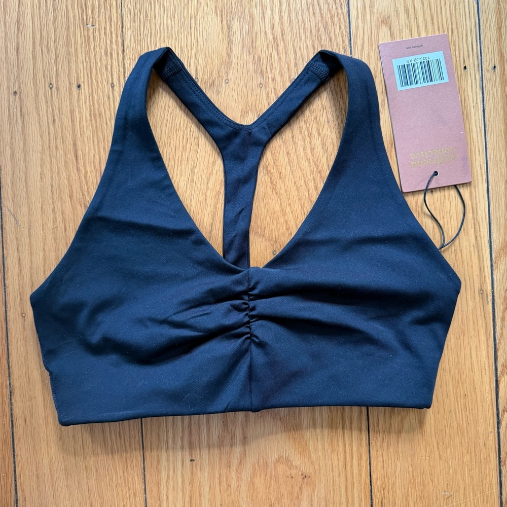 NWT girlfriend collective t back sports back with ruched front size XS